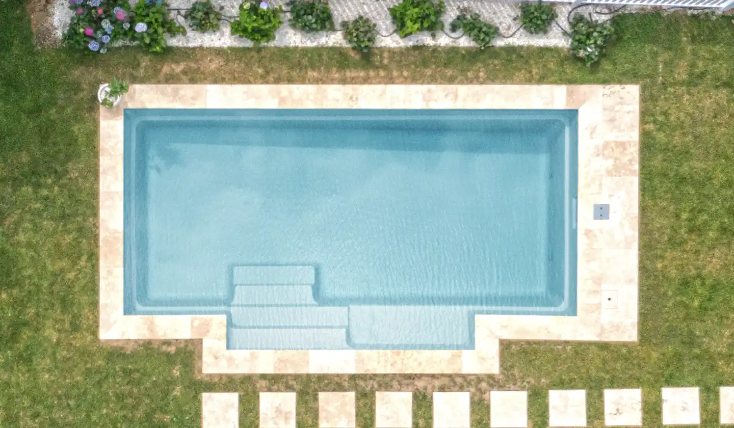 Overhead view showing The Elegance™ in Shimmer Sky, with an open swim area and stepped entry extending from one side.
