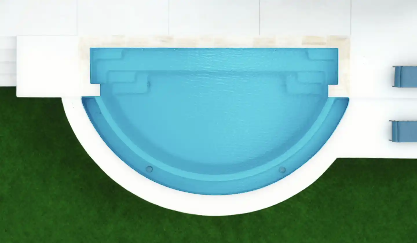 The Horizon™ fiberglass pool in Crystal Blue, featuring a semicircular swimming area and built-in catch basin.