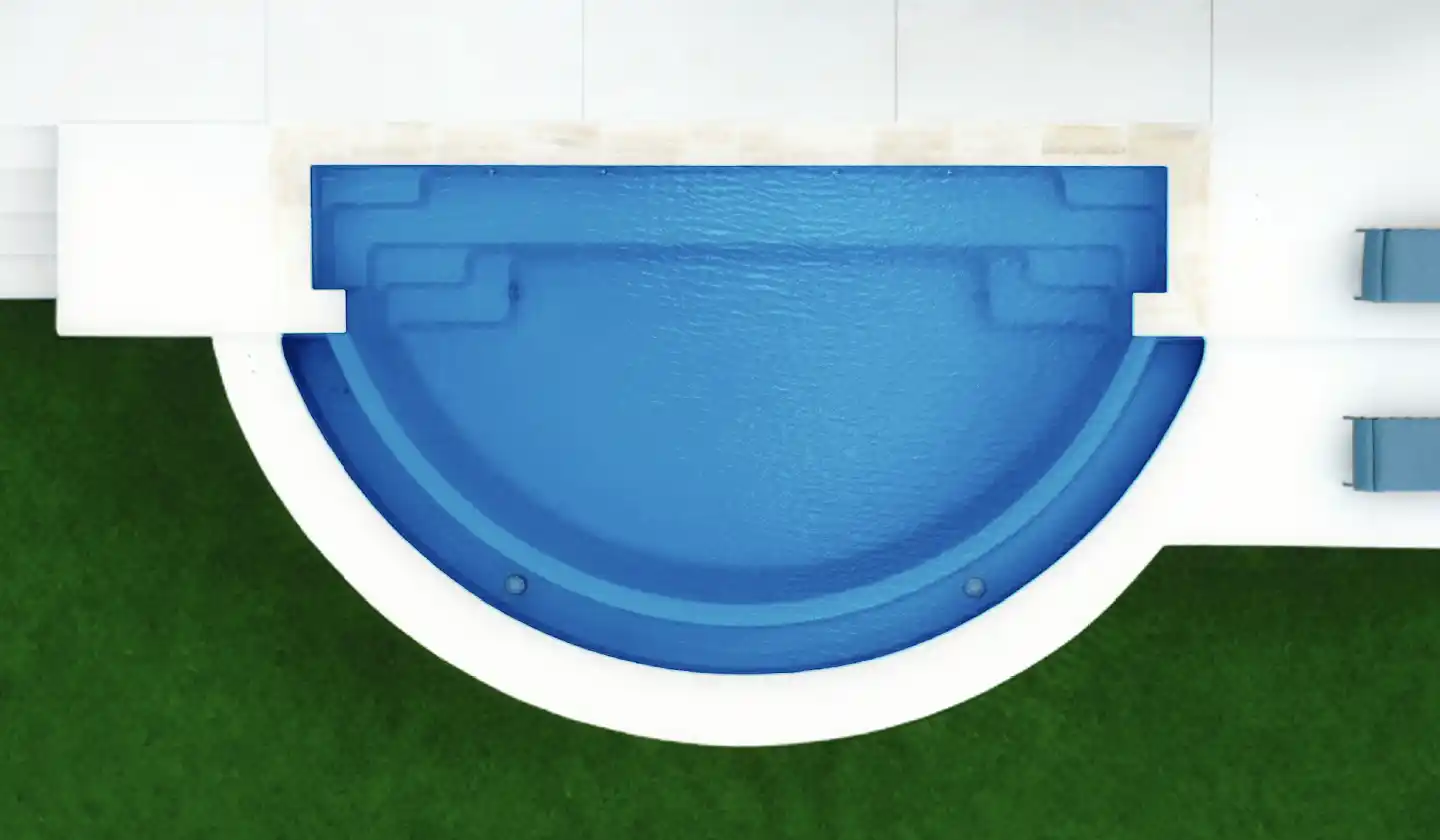 Overhead view showing The Horizon™ in Sapphire Blue, with a semicircular swimming area and integrated spillover catch basin.