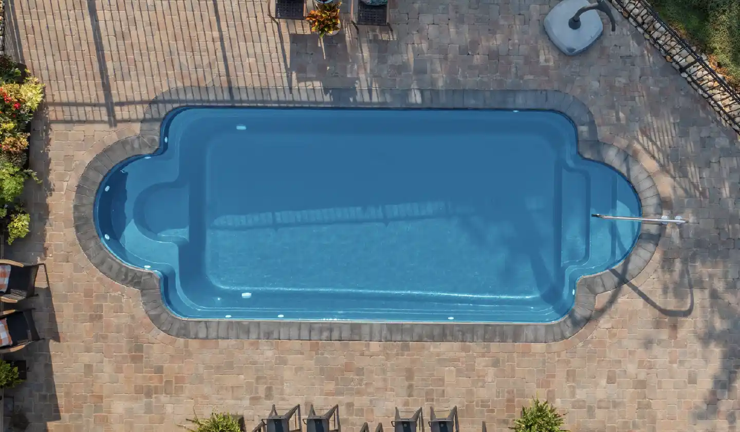 Overhead view of The Roman™ in Crystal Blue, showing a curved seating nook at each end of the swimming area.